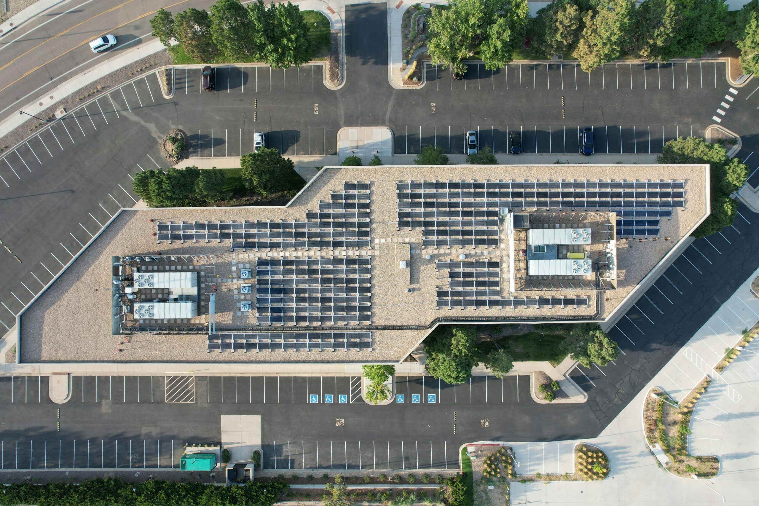 Commercial building with solar panels on the roof.
